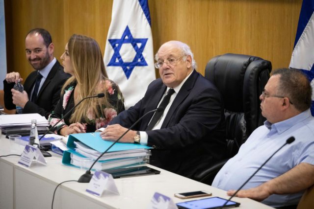 Chairman of the Election Committee, Justice Hanan Meltzer, arrives for a discussion of several parties' requests to disqualify Otzma Yehudit party from running in the upcoming Knesset elections, on grounds of racism and incitement, at the Knesset in Jerusalem, on August 14, 2019. Photo by Hadas Parush/Flash90 *** Local Caption *** ????? ???????????????????? ?????????? ???????????????????? ????????????? ???