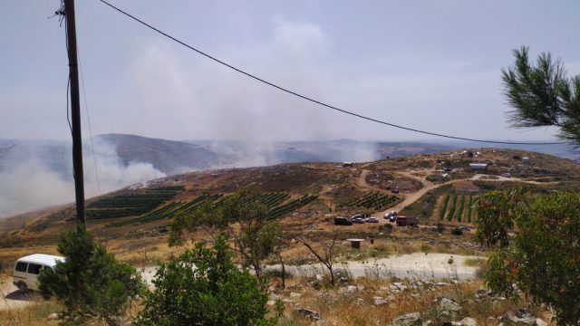האש מתקרבת לבתים (ללא קרדיט)