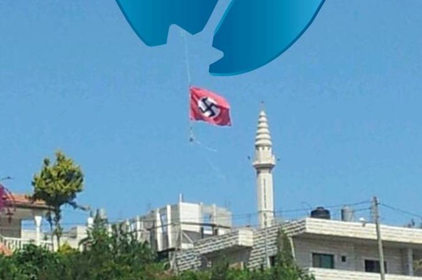 הוסר דגל 'צלב הקרס' שהתנוסס בבית אומר ליד חברון