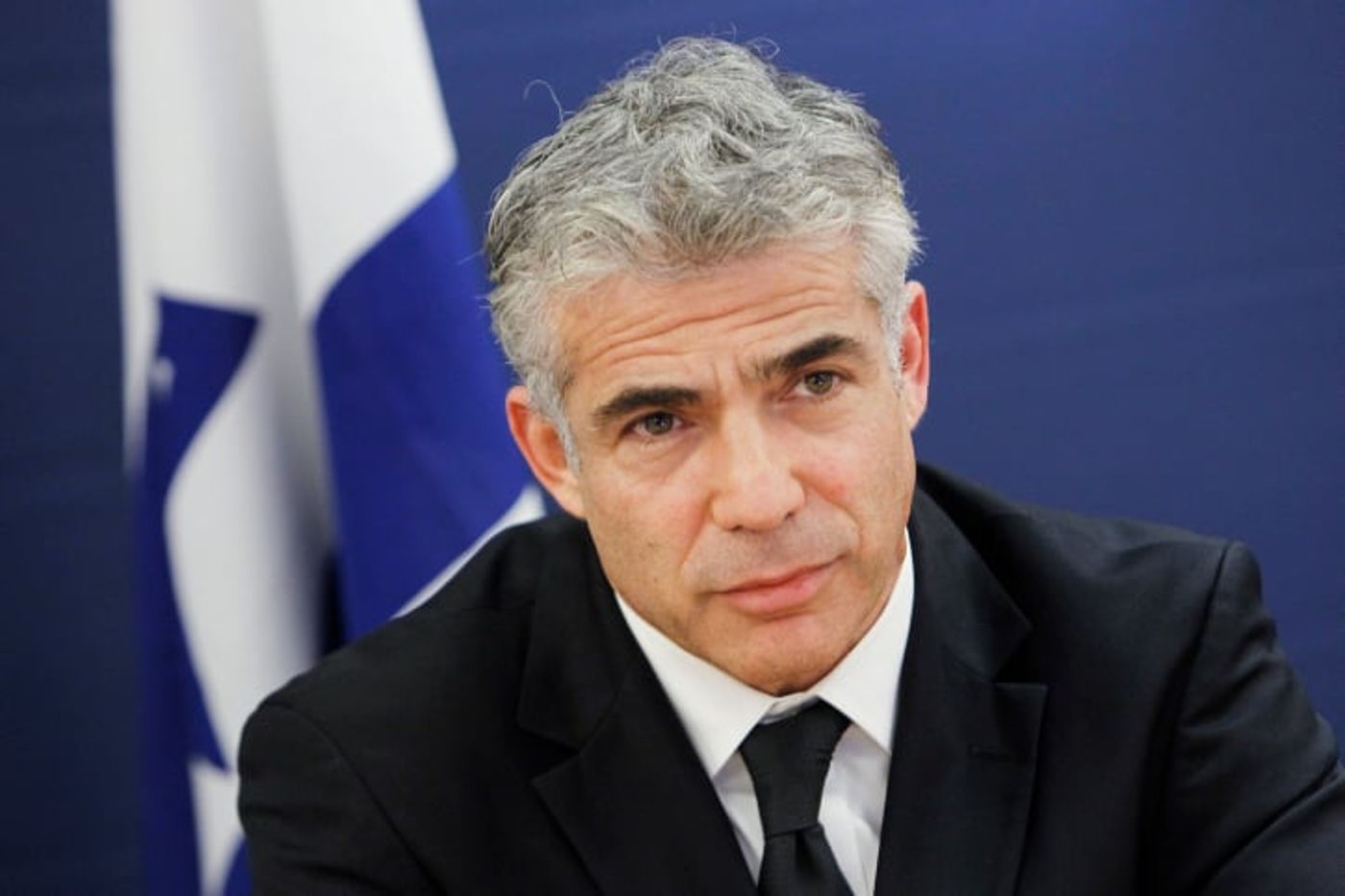 לפיד על האיומים נגדו ברצח: "מי שמאמין לא מפחד"