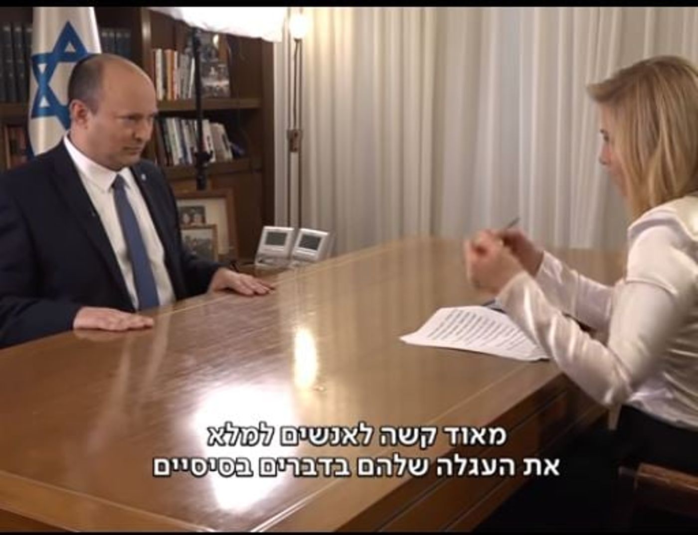 בנט מתראיין למיכל רבינוביץ' (צילומסך, מתוך "כאן 11")
