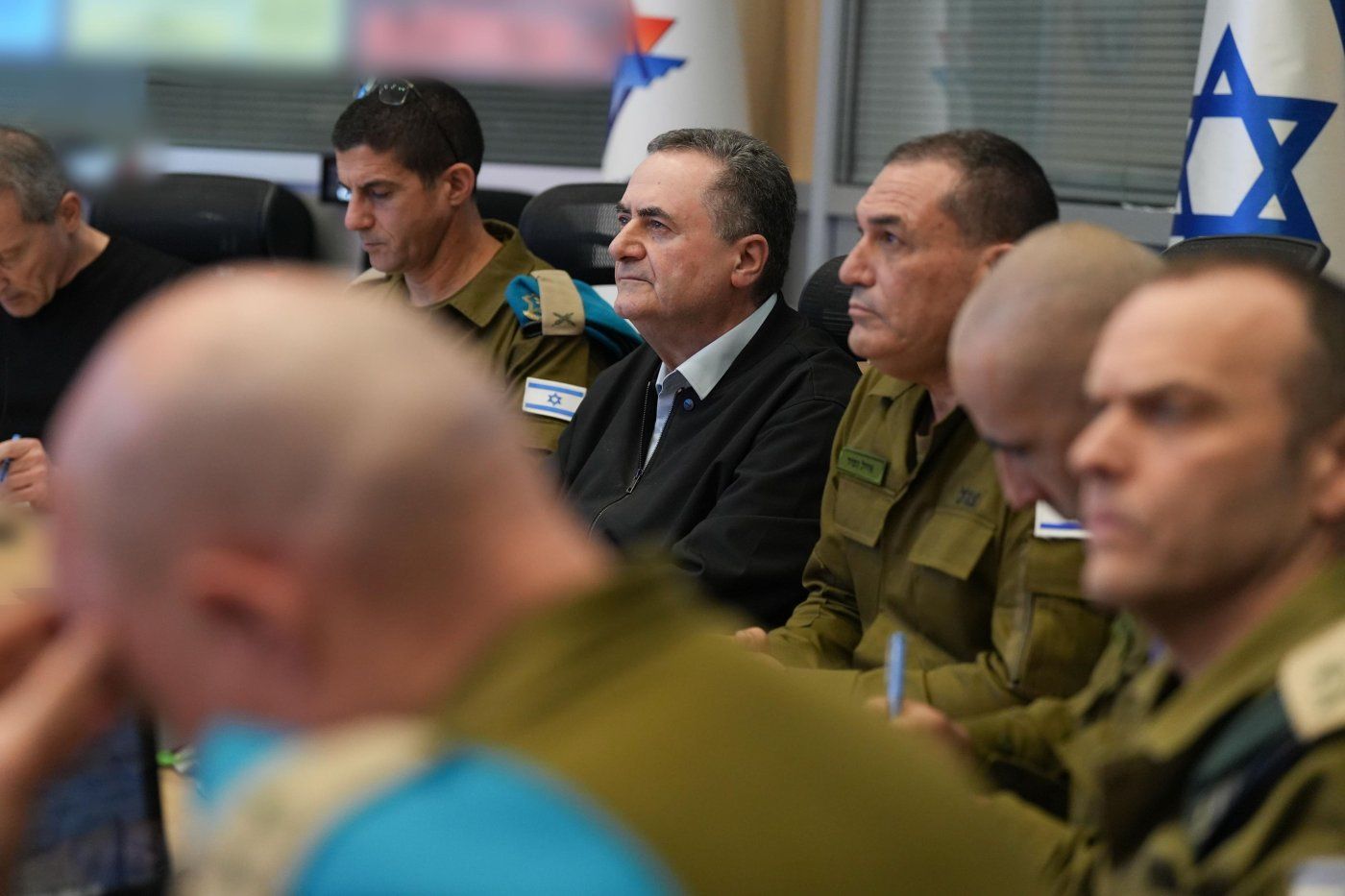 כ