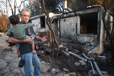עדות חיפאית: הלהבות בכרמל הציתו לבבות