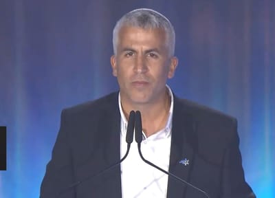 מנחם קלמנזון בעימות חריף עם אחים לנשק