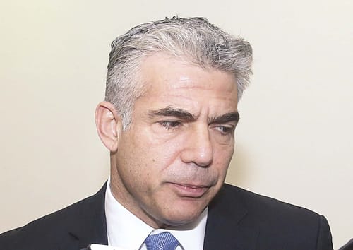 לפיד תוקף: פרסום המכרזים לבנייה ביו"ש – טעות כפולה