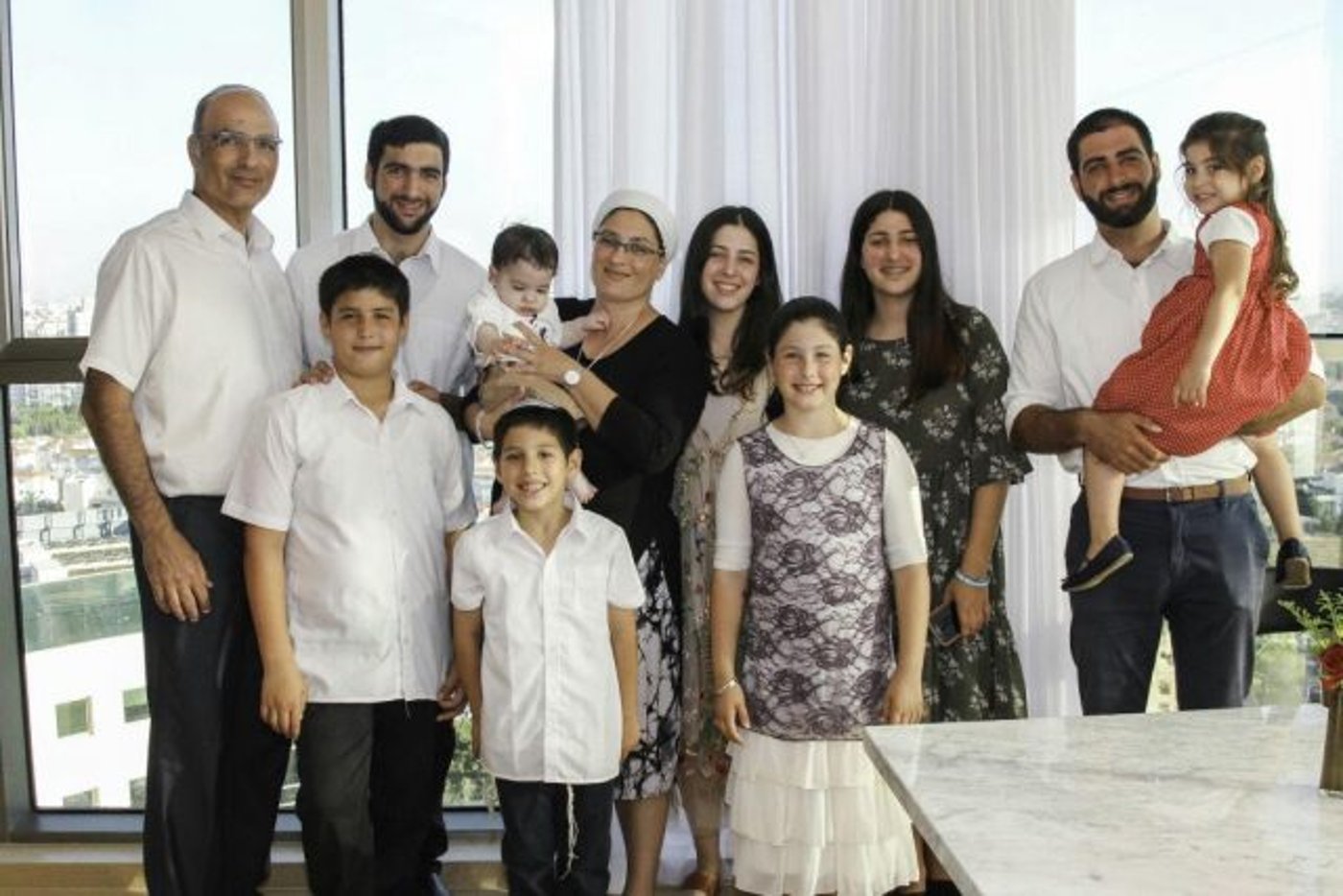 תמיכה וחיזוק. ציפי לוריא ומשפחתה. באדיבות המצלם