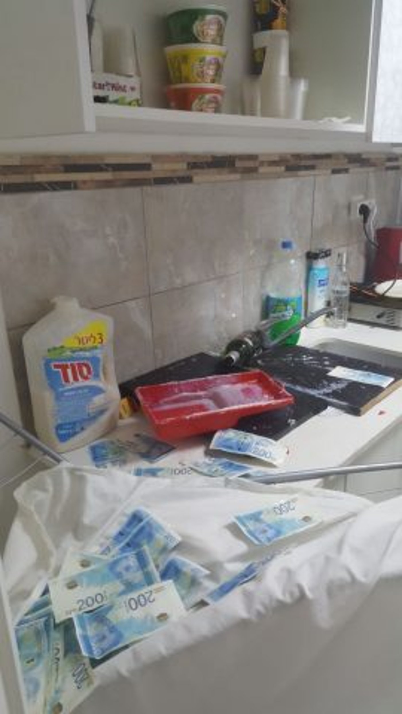 המשטרה חשפה: כך זויפו שטרות של 200 ש"ח
