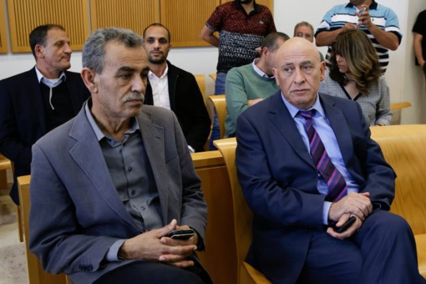 מימין ח"כ לשעבר באסל ג'טאס בעת משפטו