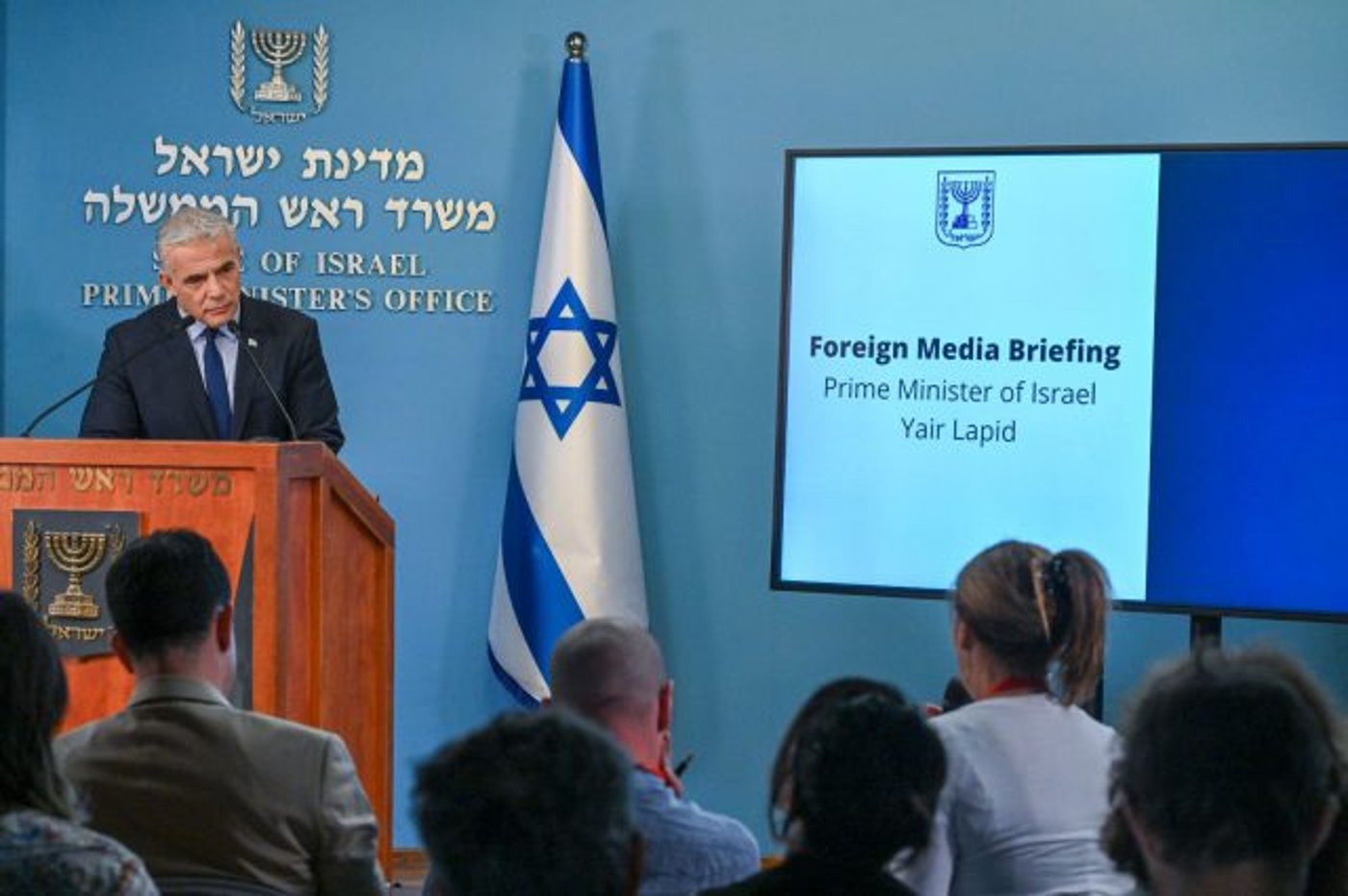 לפיד בתדרוך הכתבים