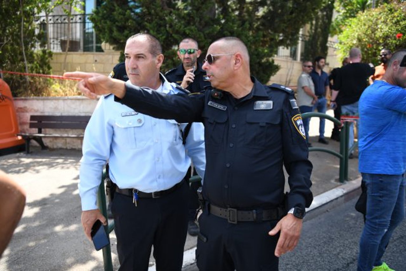 החוקרים בזירת הרצח בחיפה (דוברות המשטרה)