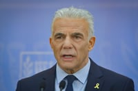 נתפס על חם: לפיד מסתבך בפרשת קטאר
